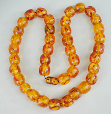AUFFALLENDE BERNSTEIN KETTE / HALSKETTE - GROßE KUGELN - 82,2 GRAMM
