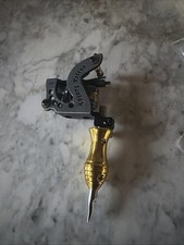 tattoo machine, that type uses electromagnetic coils to move a needle