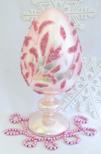 Pastel Pink Glass Egg On Pedestal Easter Decoration.
