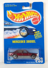 Hot Wheels Mercedes 380 SEL red #253 crease on card