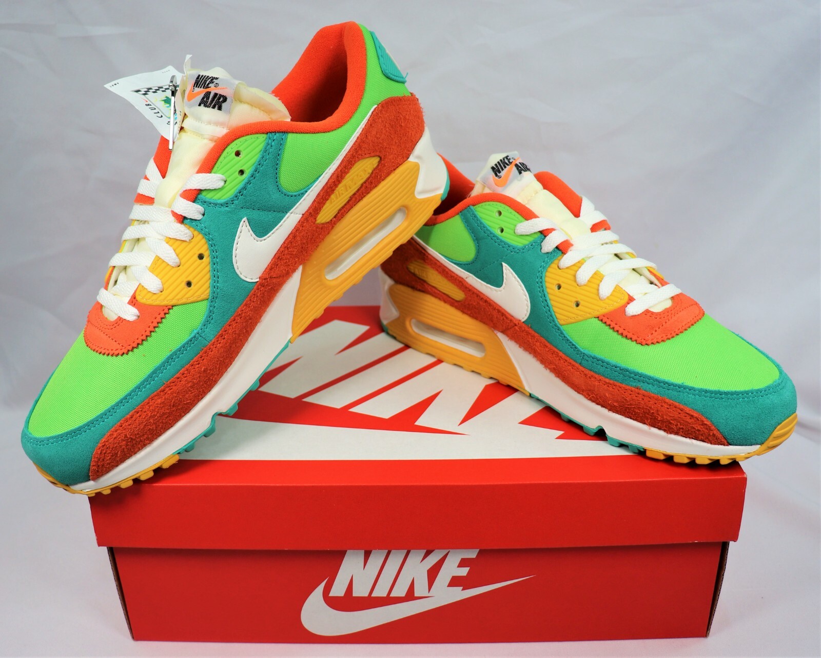 green and orange air max 90