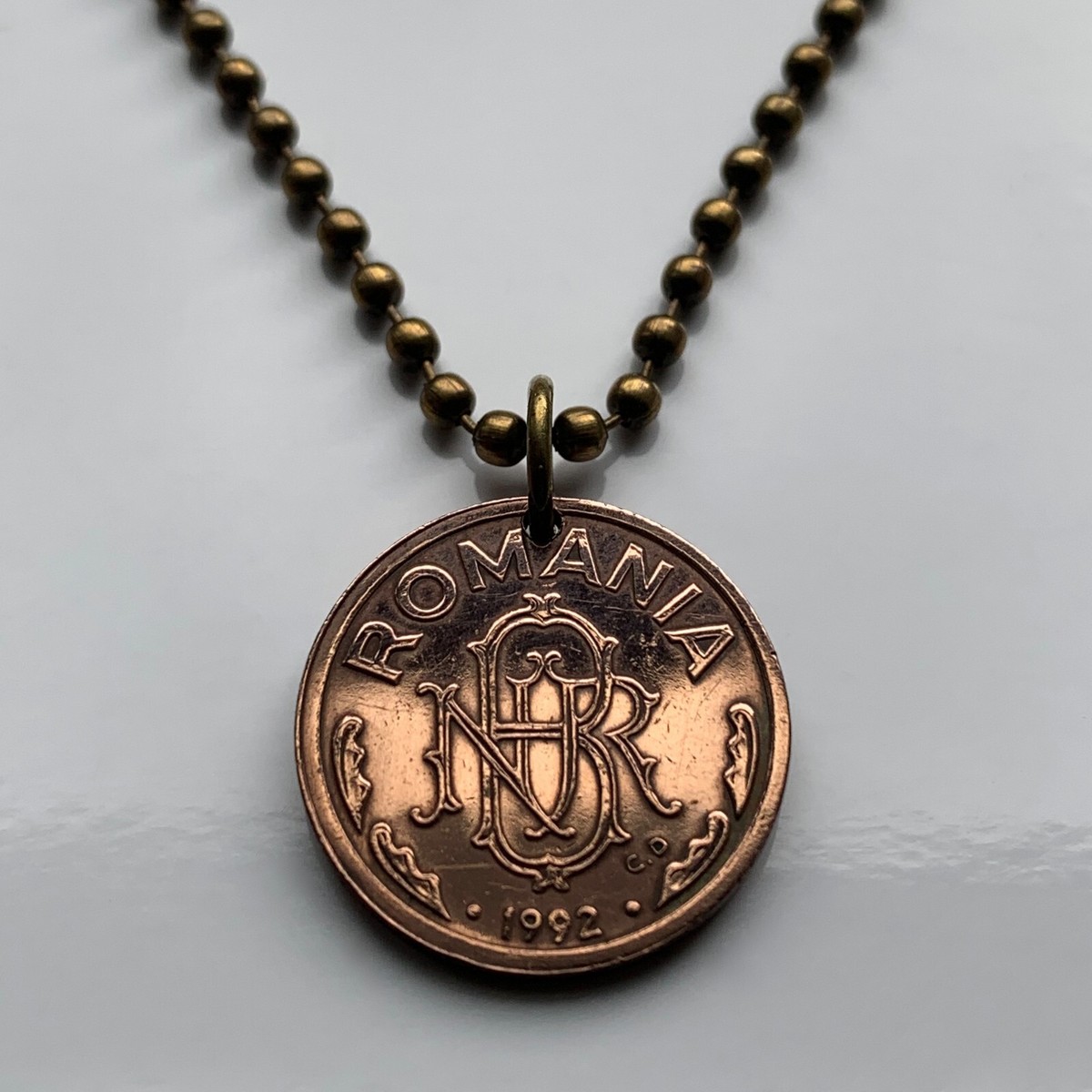 1992 Romania Leu coin pendant National Bank NBR Bucharest Cluj-Napoca Iasi  00363