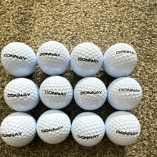 12 x Donnay golf balls. Pearl condition