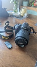 Nikon D D5100 16.2MP Digital SLR Camera - Black (Kit with VR 18-55 mm Lens)