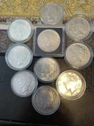 10 Peace Dollars, 90 % Silver.