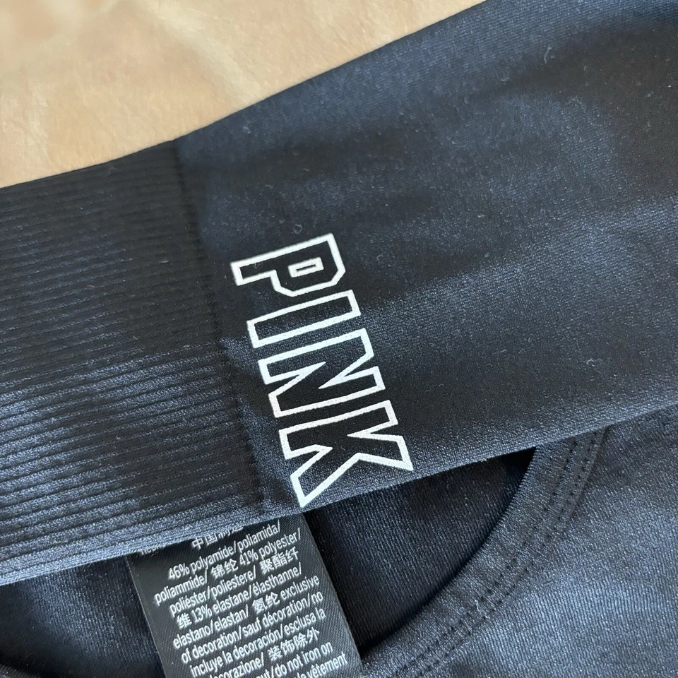 Top corto Victoria’s Secret ROSA activo manga larga negro talla pequeña. Gimnasio deportivo Foto 3 de 4