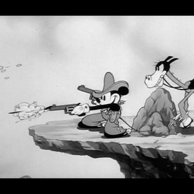 Mickey Mouse T-shirt with cowboy and two pistols Size M vintage