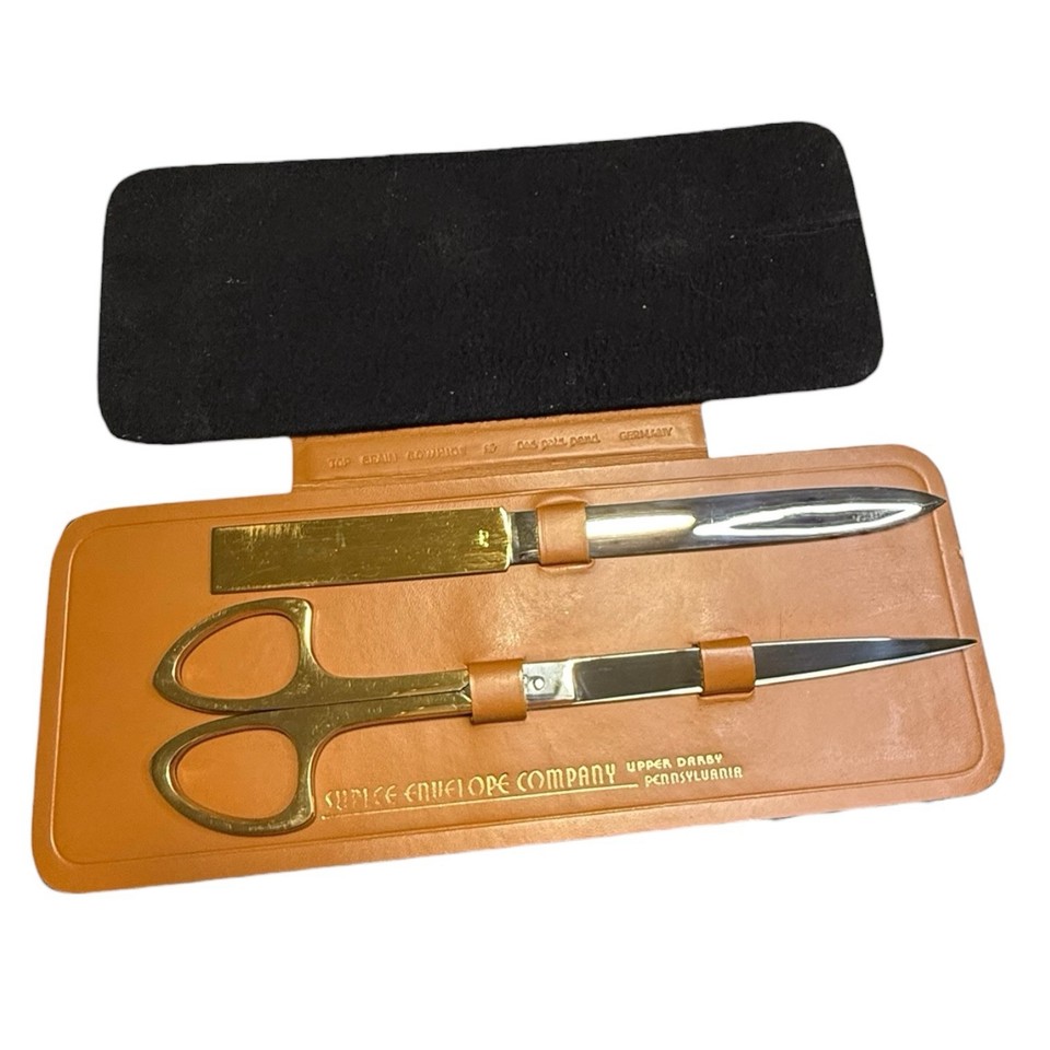 A matched Italian/German vintage desk set with scissors and letter opener — European-made MCM tools that are actually beautiful objects.