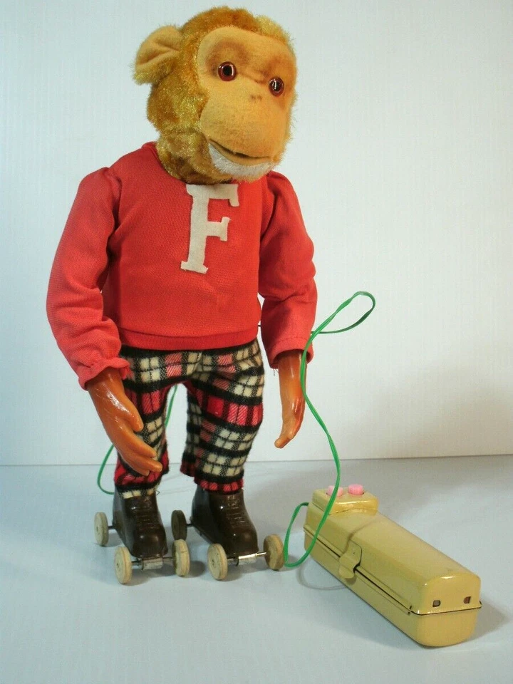 Juguete de colección a pilas "Frankie el mono patinaje sobre ruedas" en caja Foto 2 de 4