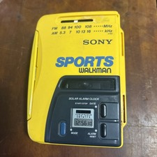 Sony Sports Walkman WM AF58 WORKS READ Cassette Player AM/FM Solar Clock