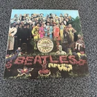 THE BEATLES SGT. PEPPER’S LONELY HEARTS CLUB BAND 1967 PARLOPHONE LP RECORD.