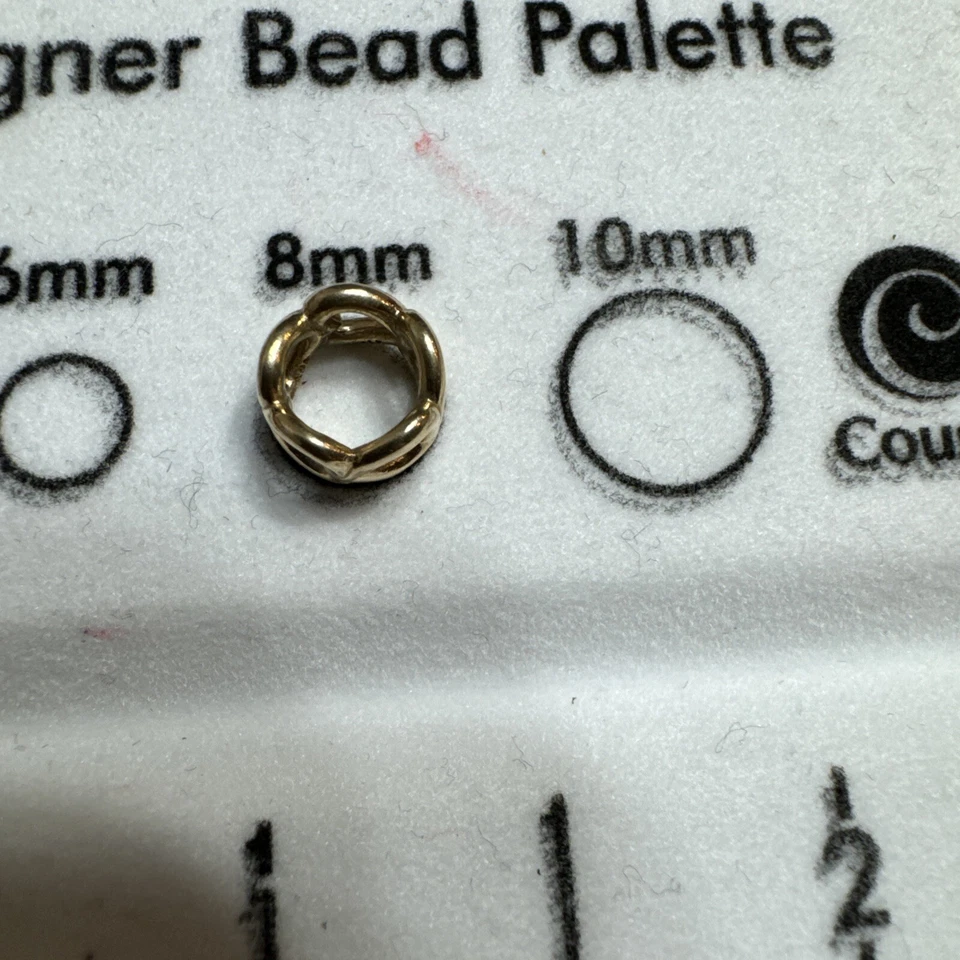 espaciador pandora oro 14k Foto 3 de 4