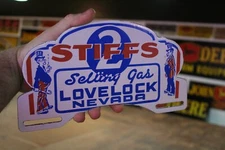 2 STIFFS SELLING GAS STATION LOVELOCK NEVADA PORCELAIN METAL PLATE TOPPER SIGN 