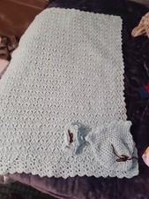 Handmade crochet blue baby blanket with matching hat and booties