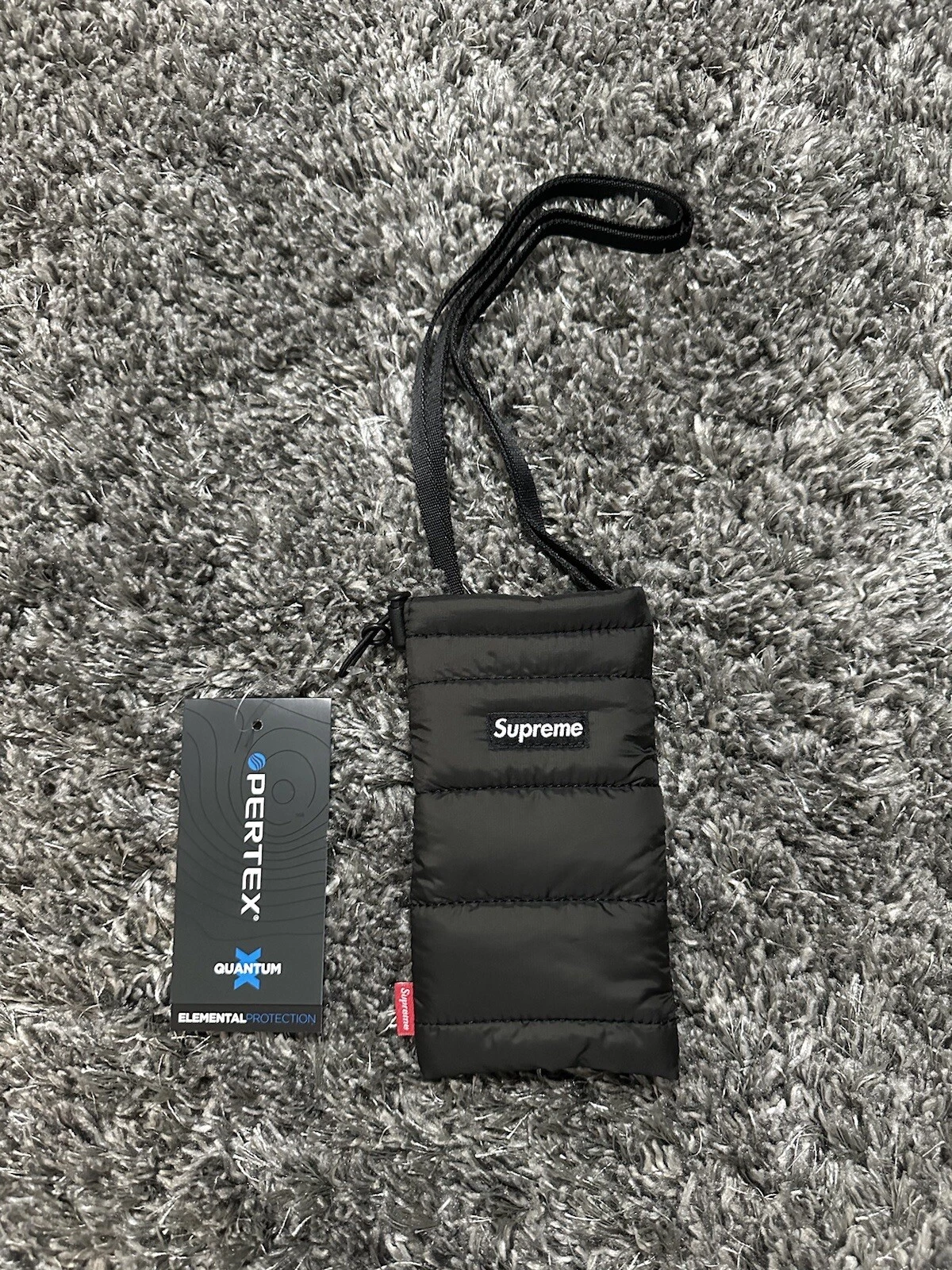 Pochette Supreme Puffer Neck   Noir