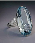 6Ct Oval Aquamarine Simulated Diamond Women'S Halo Ring 925 Silver Gold Plated