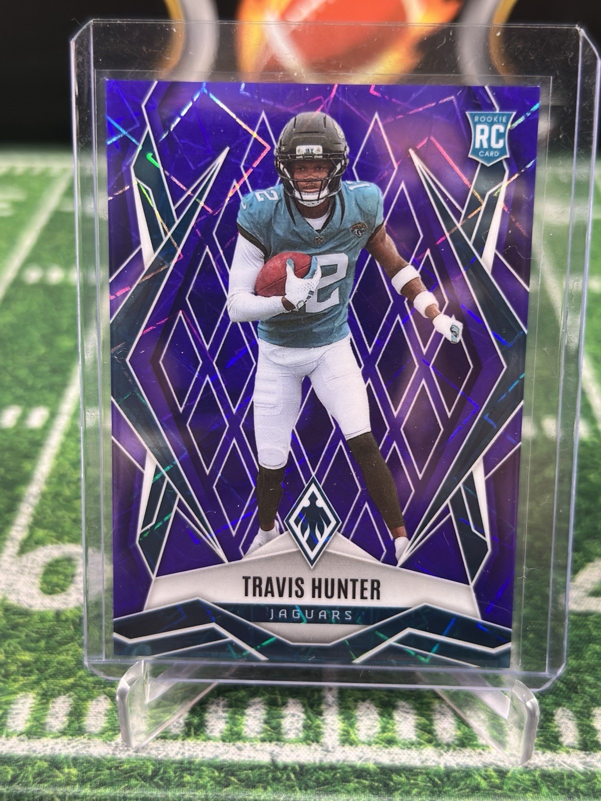 2025 Panini Phoenix Rookies Travis Hunter #157 Purple Lazer /99 JAGS