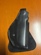 New RH Safariland Sig P239 high-ride paddle holster with thumb break, 518-75-61