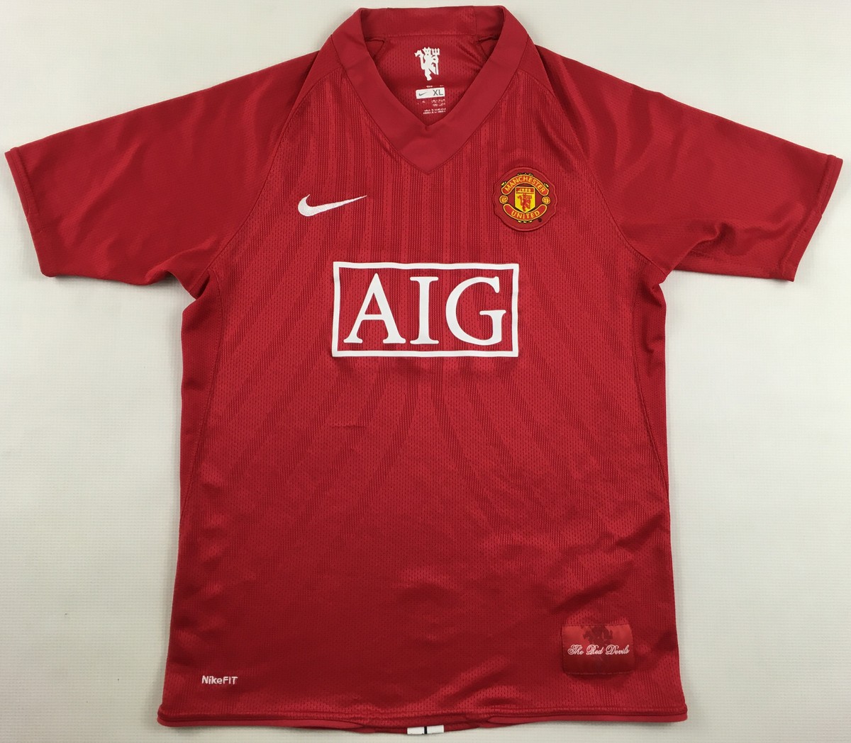 人気　レア　NIKE Manchester United AIG Jersey Manchester United 2007-09 2009 Nike AIG jersey home shirt BOYS XL