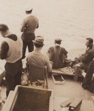 1940s-50s Group Men Fishing Boat Calm Water Leisure Scene