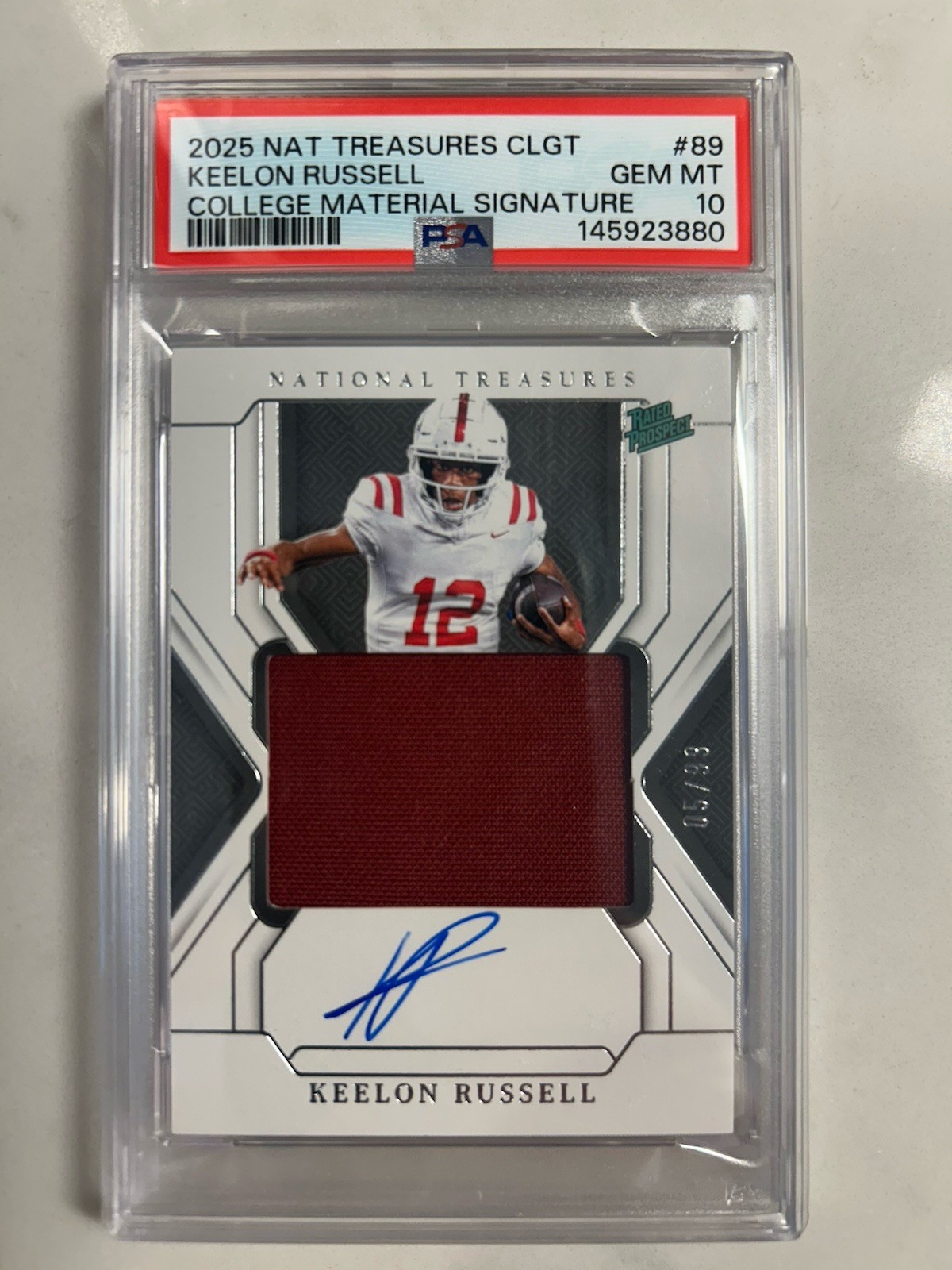 2025 Panini National Treasures Keelon Russell Rookie Patch Auto #’d /99 PSA 10