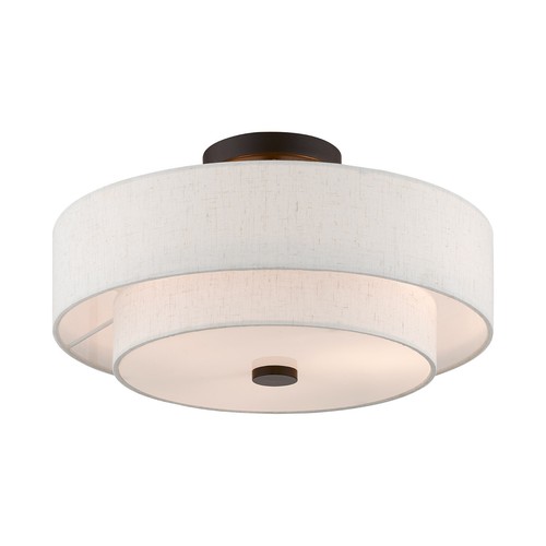 Clean and minimal 3-light flush mount with oatmeal drum shade and white diffuser - Picture 4 of 15
