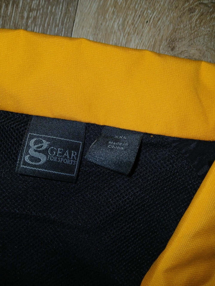 JAQUETA CORTA-VENTO ENGRENAGEM PARA ESPORTES PRETA E DOURADA COM ZÍPER TAMANHO XXL - Imagem 2 de 4