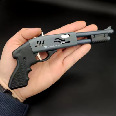 Gummiband Schrotflinte 8 Schuss Zappelspielzeug Mini Metallpistole ShotGun Spielzeug mit Bändern