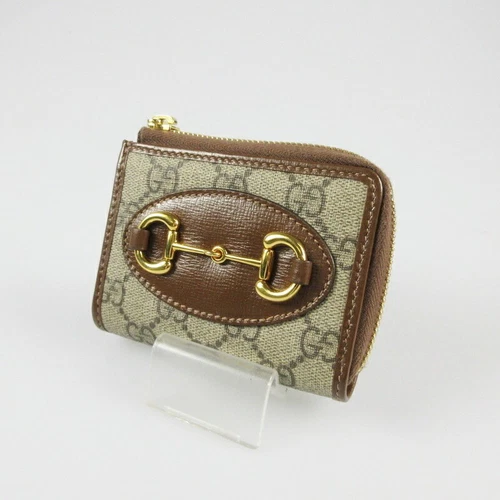 Portefeuille zippé unisexe Gucci GG Supreme Horsebit 1955 d'occasion 644459