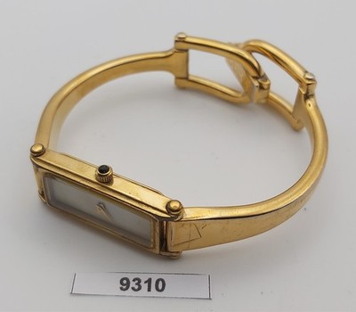 Ladies Gucci Gold Tone Black Dial 1500 Bangle Watch for sale