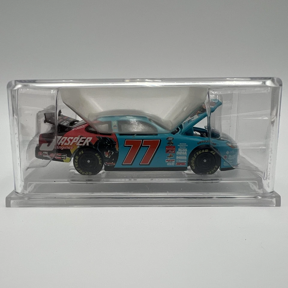 Coche diecast Ford Taurus 1:64 vintage Team Calibre 2000 motores Jasper con certificado de autenticidad en caja Foto 2 de 4