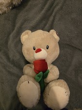CLINTONS VALENTINES BEAR WITH ROSE PLUSH SOFT TOY WITH TAG