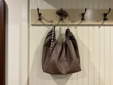 HAND BAG, SHOULDER, CROSS BODY STRAP, GOLD CHAIN ON HANDLE, BROWN, USED ONCE,