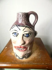 carolyn simons face jug, pottery, folk art  7''x 5''