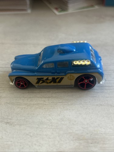 Hot Wheels 2005 Cockney Cab II. Blue, Yellow and White - Picture 2 of 5