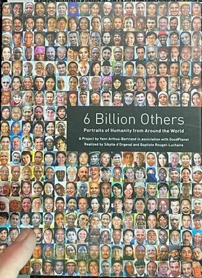 Trade Paperback book ,  6 Billion Others'' by Yann Arthus-Bertrand  -G