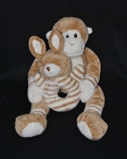 Peluche doudou singe tenant so…