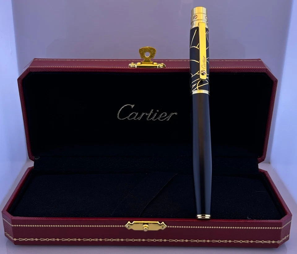 Bolígrafo Santos De Cartier {tinta azul} cuerpo de diseño de lujo negro y dorado Foto 3 de 4