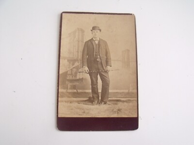 1890' s Cabinet Card of Dapper Man in Front of Painted Brooklyn Bridge Scenery