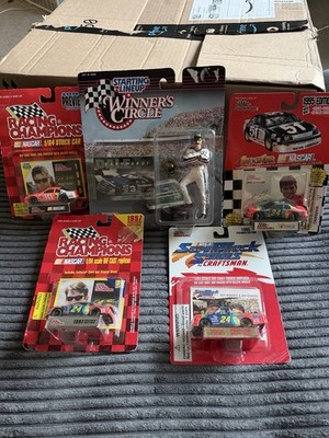 Nascar model cars - 4 1/64 scale models years 1995-1997 and a Winners circle