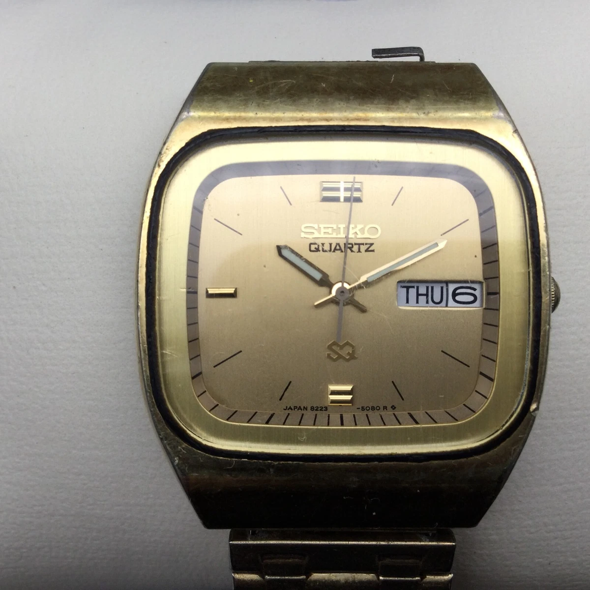 Mens gold square outlet watch