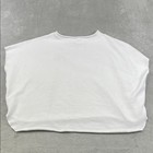 White 100% cotton funnel neck capelet with long sleeves, made in USA, displayed flat on a textured gray surface.