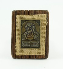 Quadro ECCE HOMO  in lega ottonata con iuta su tavoletta di legno