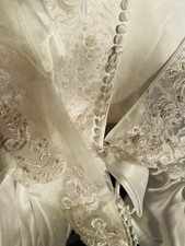 Wedding Dress. Long Sleeve with Elaborate Embroidery and Long Train.