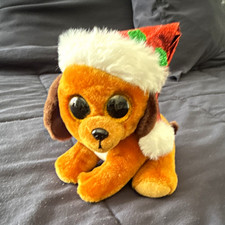Peluche Ty Beanie Babies Dog Beanbag avec chapeau de père Noël rouge et vert.