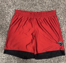Vintage nineties red and black Nike Team tag size large basketball shorts.