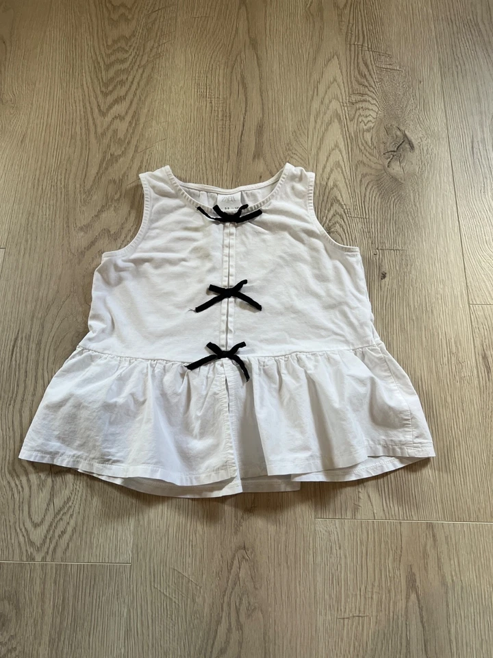 Top Zara Niño con Lazos - Blanco y Negro Talla. 8-9Y Foto 2 de 4