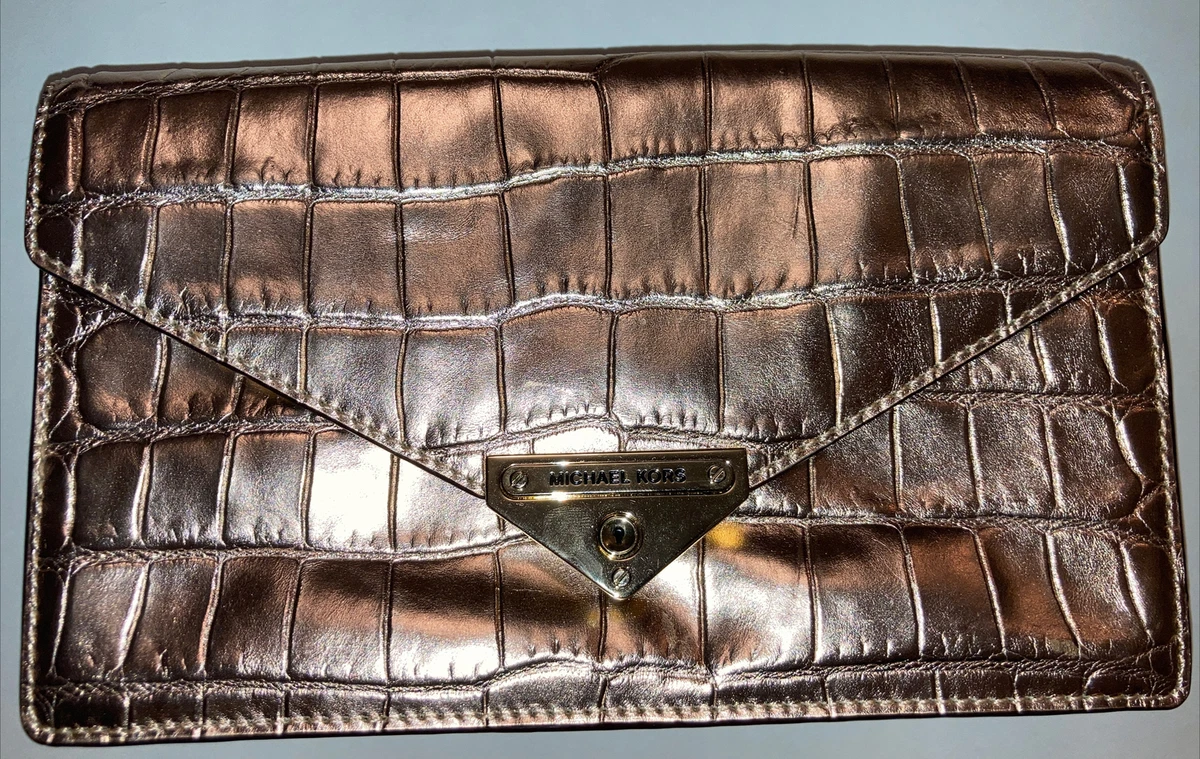 Michael kors rose gold metallic wristlet deals