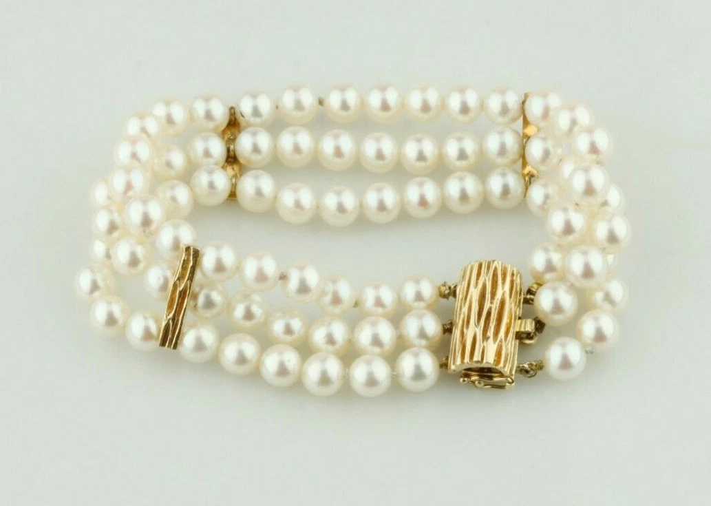 Triple strand pearl bracelet deals