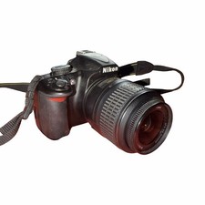 Nikon D3100 Digital Camera With Lens, Charger, Battery And Strap